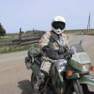 Chris and his Army-issue KLR. Where's the ammo box?