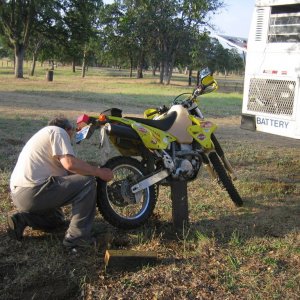 Tom fixing a flat on day 1